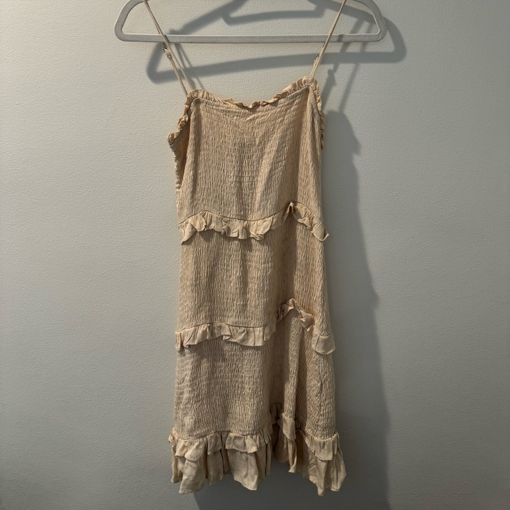 Beige ruffled mini dress